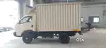 Bada Dost Truck driver with transport badge