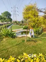 Developed society mein plot in kisan path