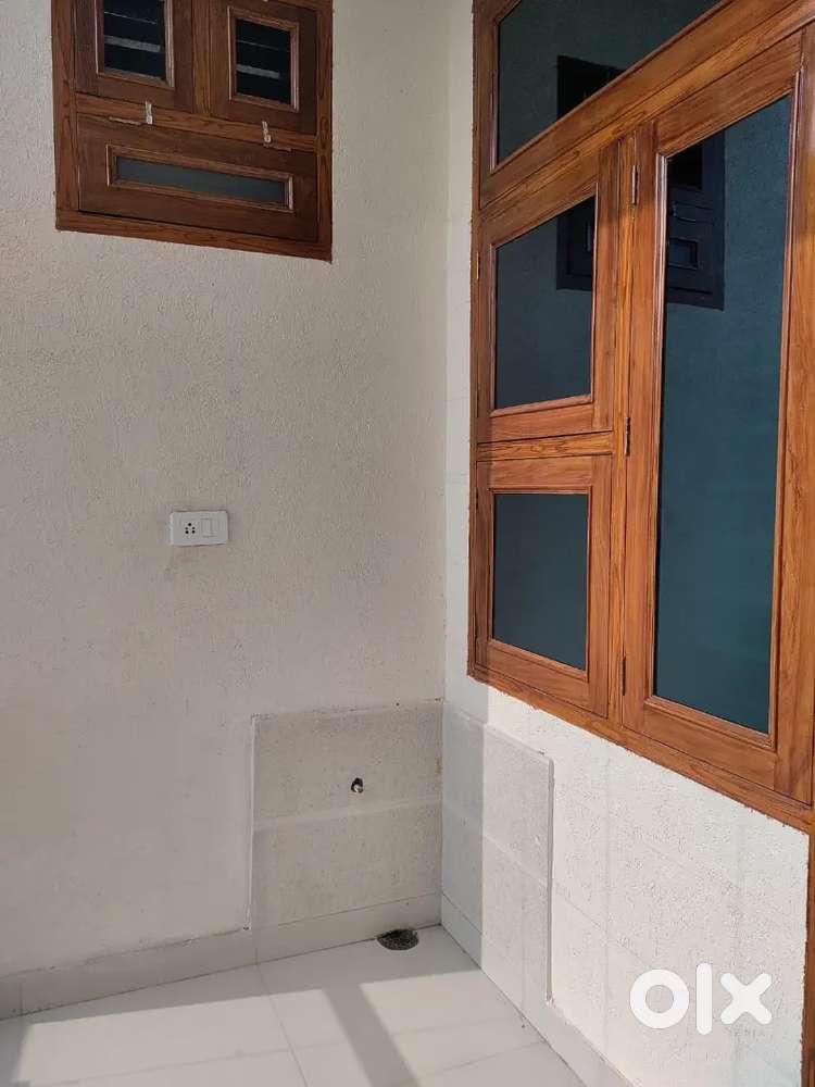 Park facing house. This property on first floor.