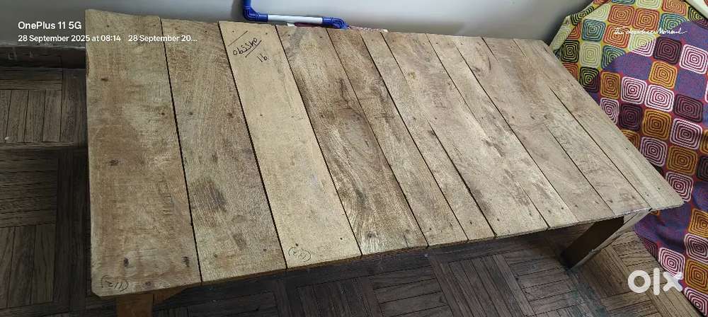 Wooden bed with cotton mattress