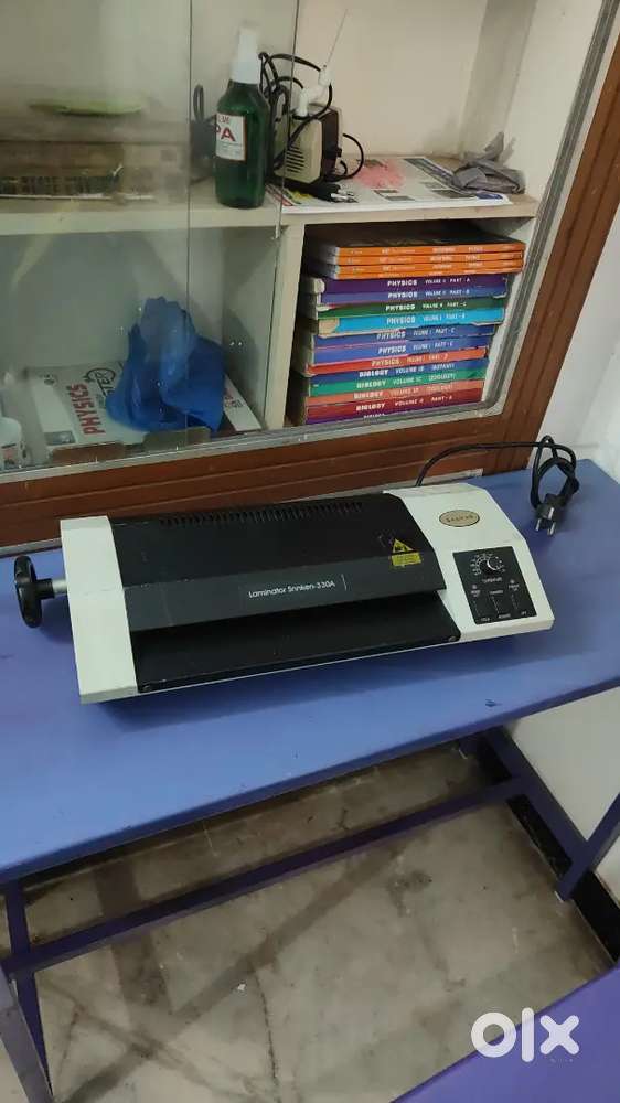 LAMINATOR AND PUNCHING MACHING