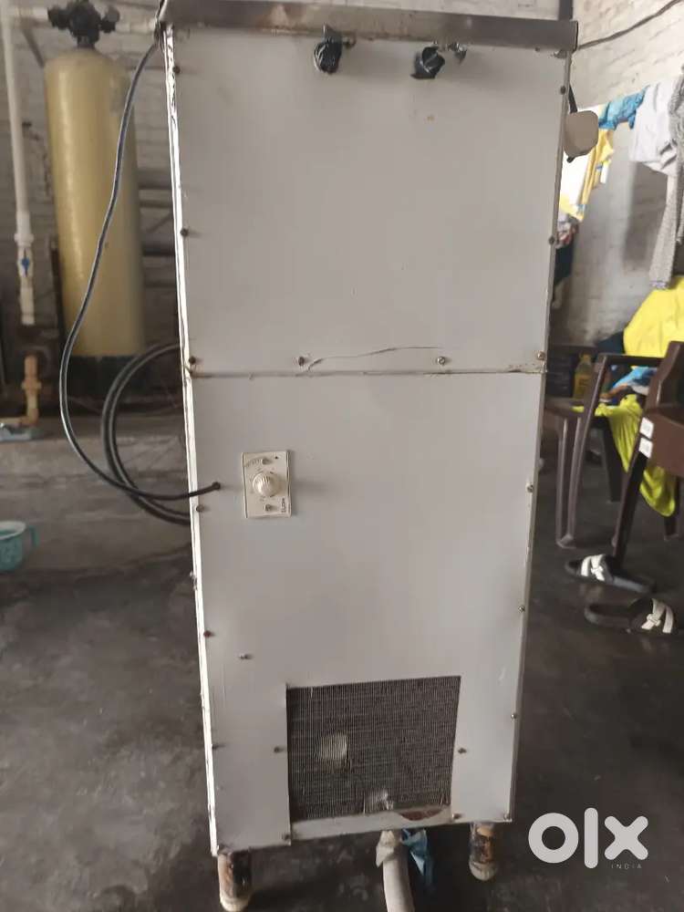 Water cooler with dispenser