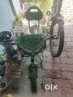 7yo kids cycle with supporters