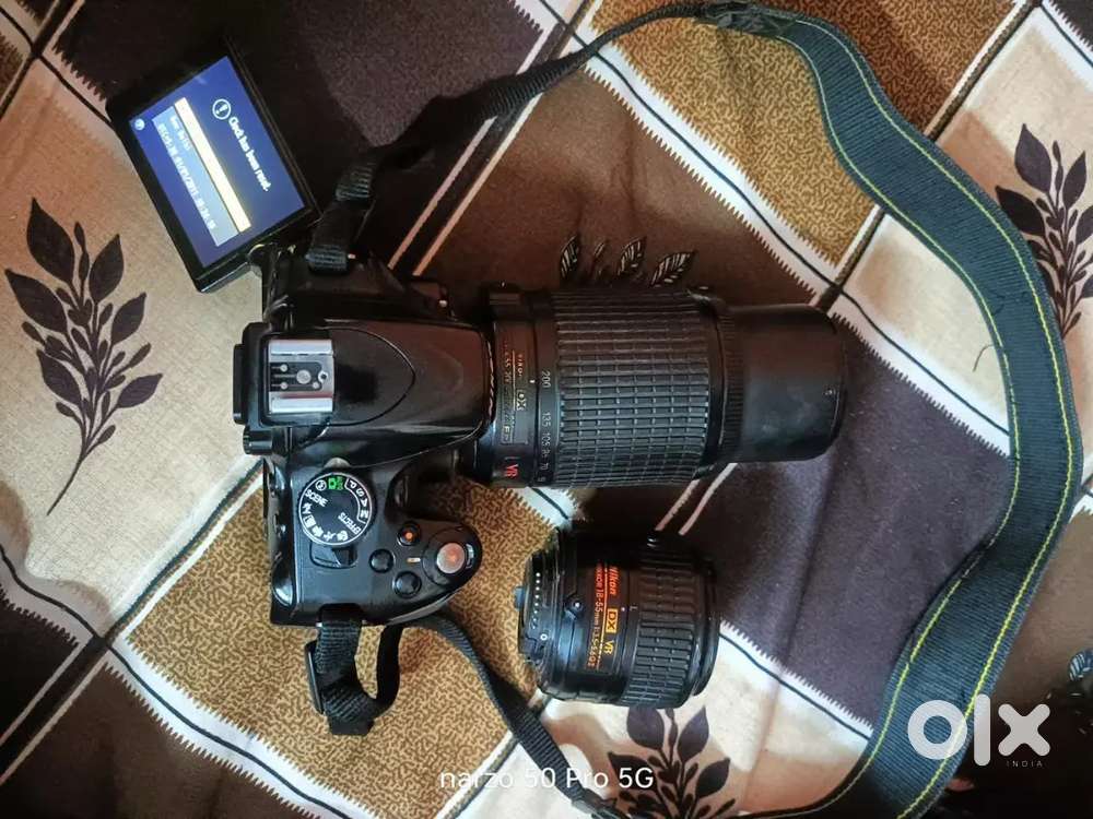 Nikon d5100 flip display camera with 55_200mm lens and 18_55  all kit