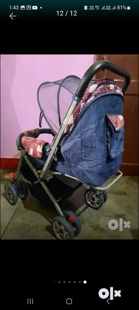 Reversible Baby stroller with mosquito net and wheel break system