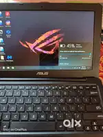 Asus E202s in near to new condition
