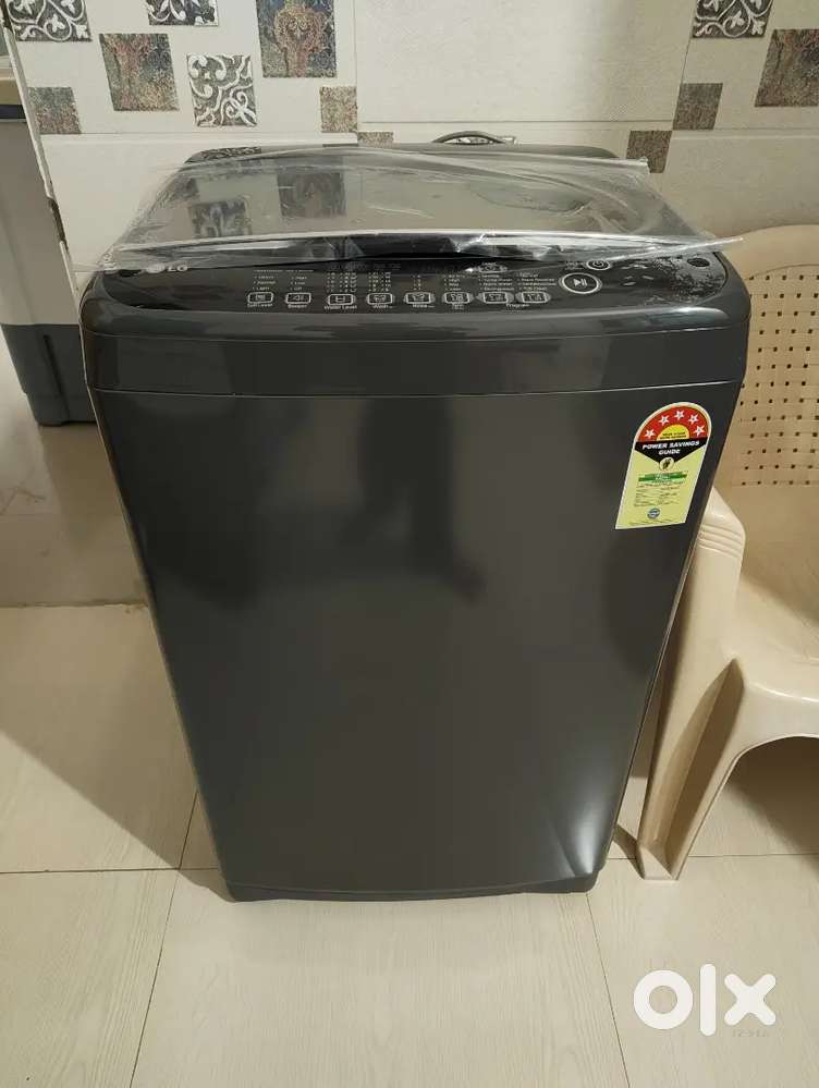 Unused 8kg top load LG washing machine