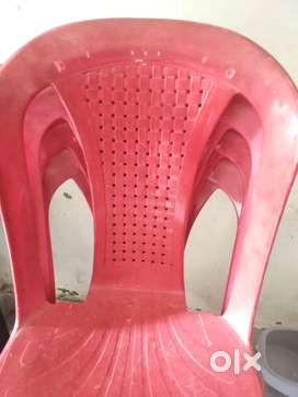 Rocking wooden chair and plastic chair