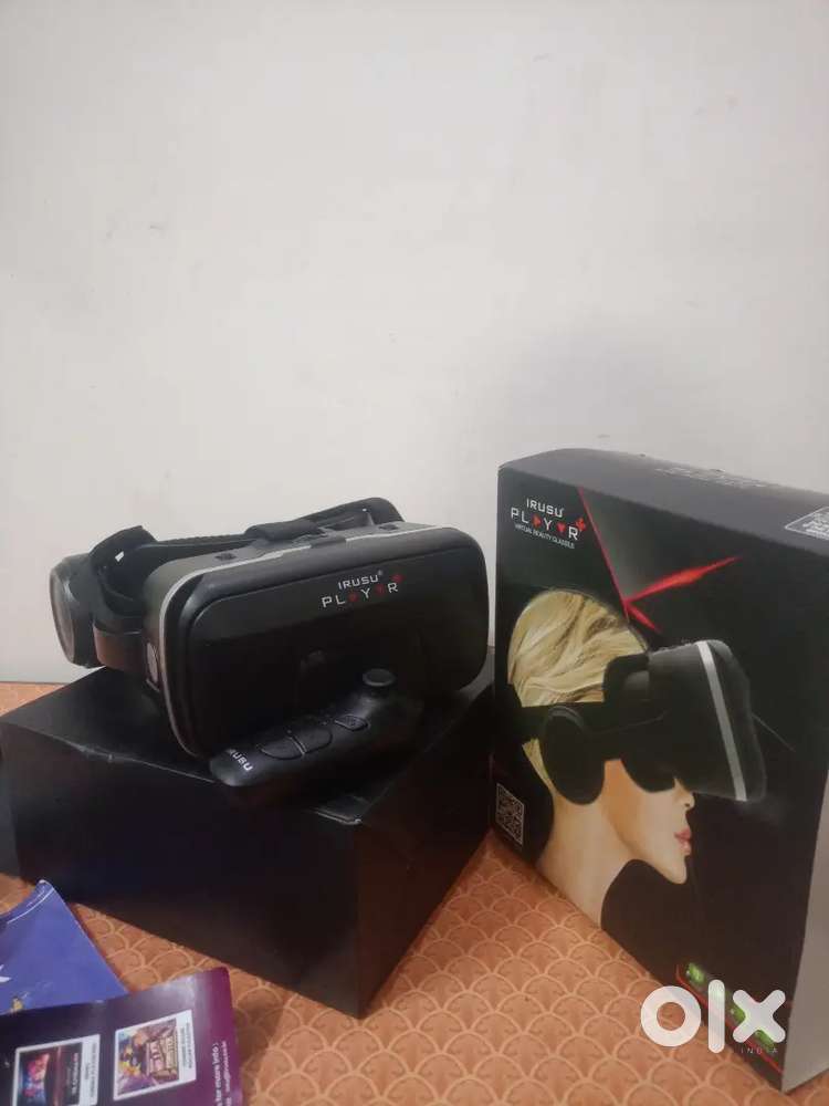 Irusu VR headset with attached headphone and remote only on 2500rupees