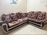 Sofa set with covers and woden table is for sale