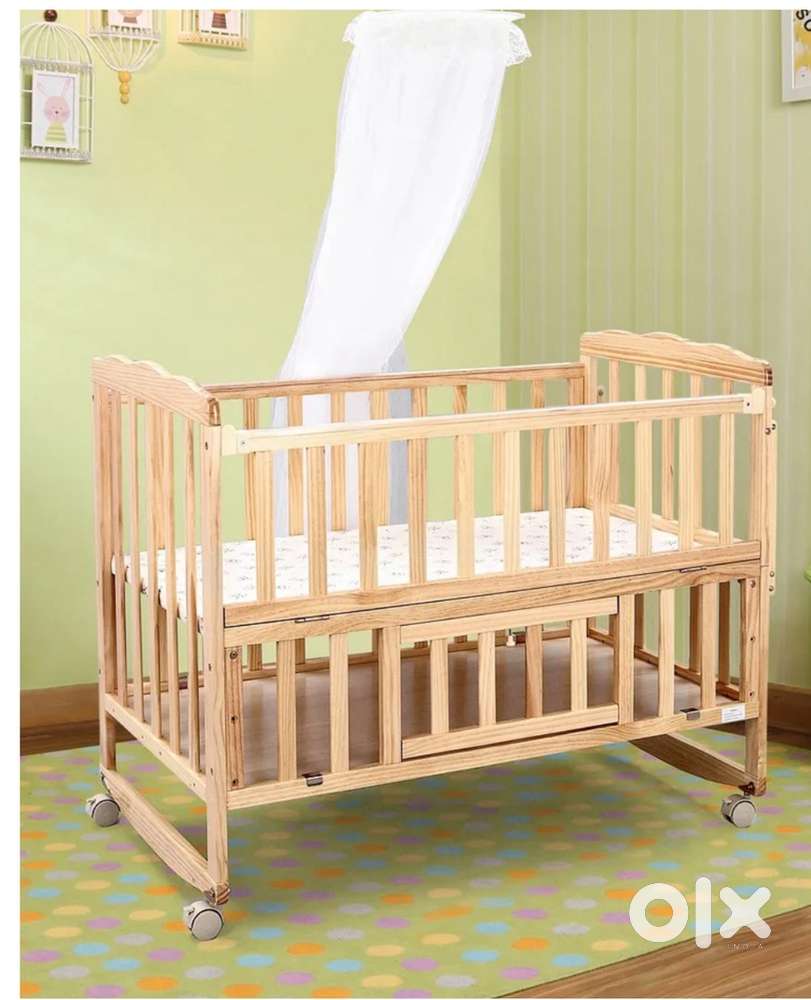 Babyhug baby wooden cot cum rocker with mosquito net