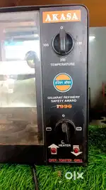 CAFE ITEMS - OVEN ,TABLE,LED FOCUS LIGHT,OPEN BOARD AND GREEN CARPET