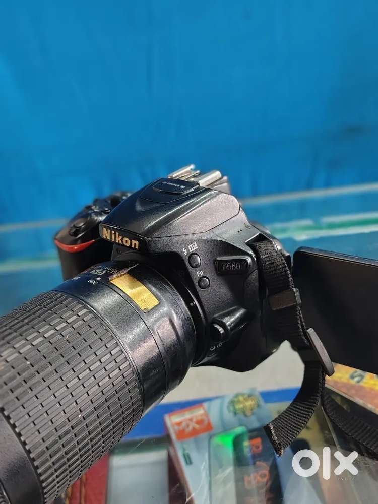Nikon d5600 with 18.55 70.300and 18.140 lens 2 battry charger and beg