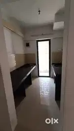 Road view 1bhk flat for sale palava city