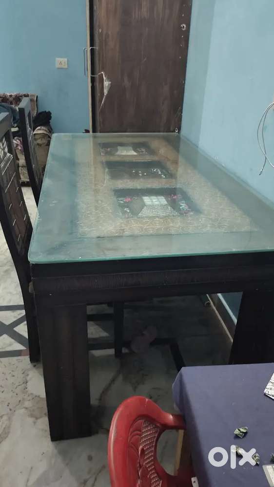 Dining table with six chair teak wood polish with wall nut