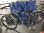 Greyish colour With 21 gears
