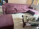 L- shaped sofa with pouffe