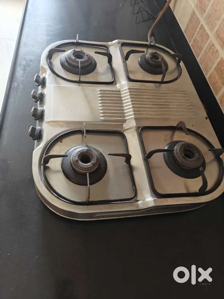 Four gas stove for cooking