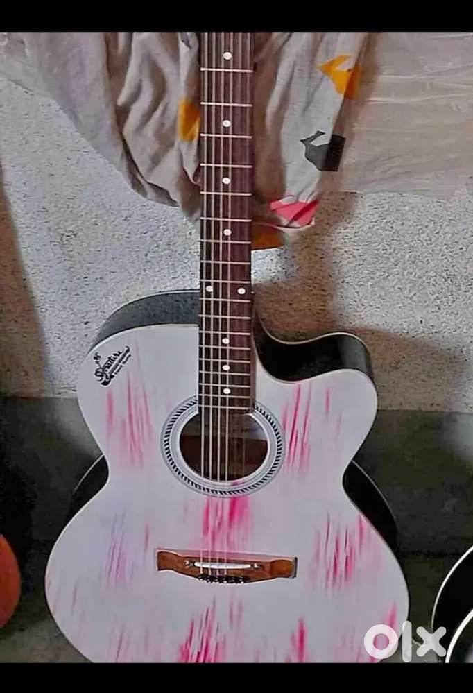 New musical guitar for sale and 1 year warranty.      Cach on delivery