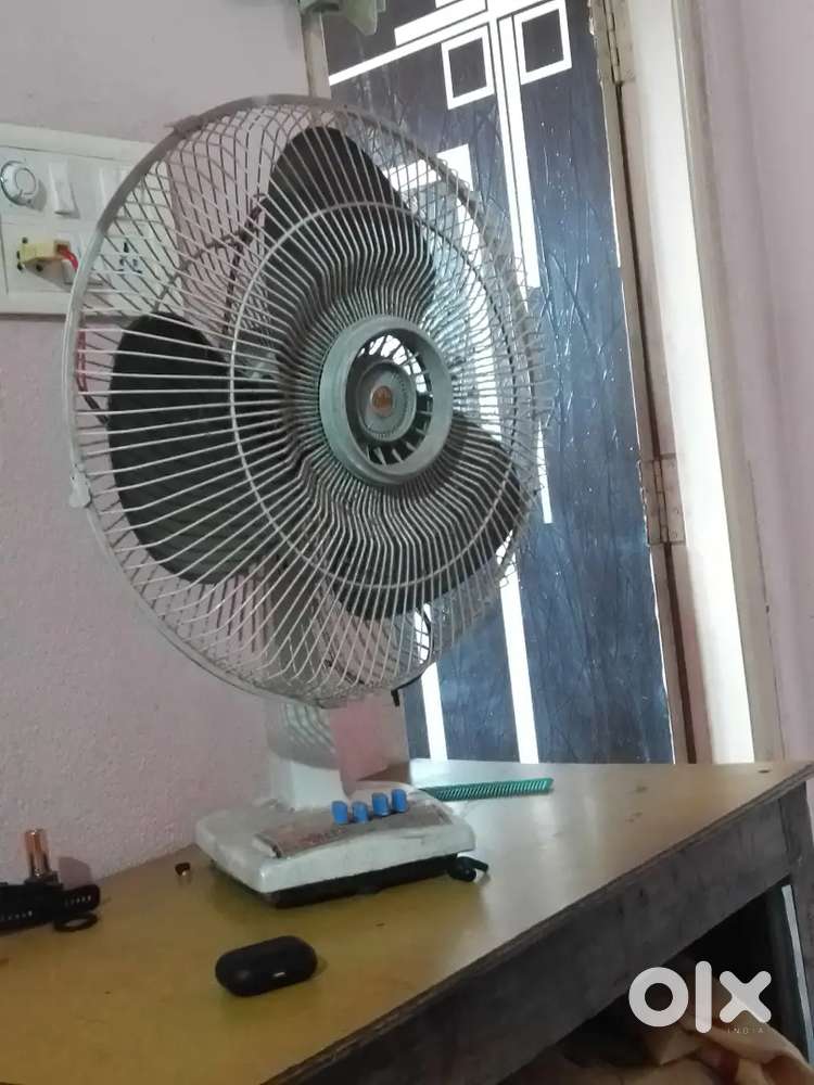 2 fans and 4 chair and tea table