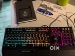 Keyboard , 2 mouse , 2 mousepads, 1 printer, 1 laptop stand