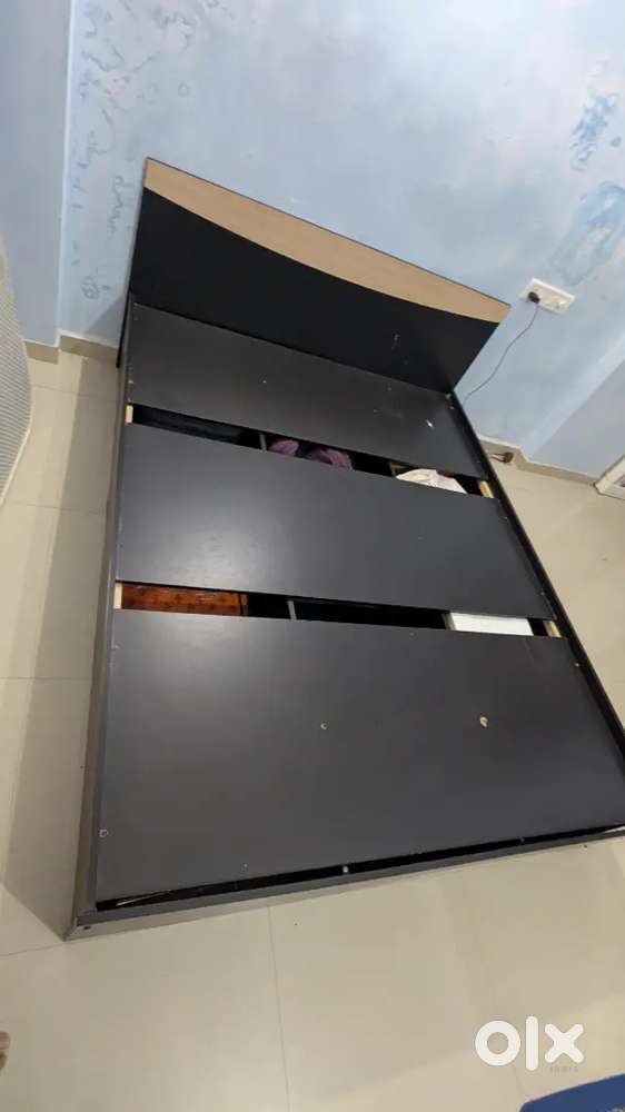 Queen size bed with mattress and three door cupboard