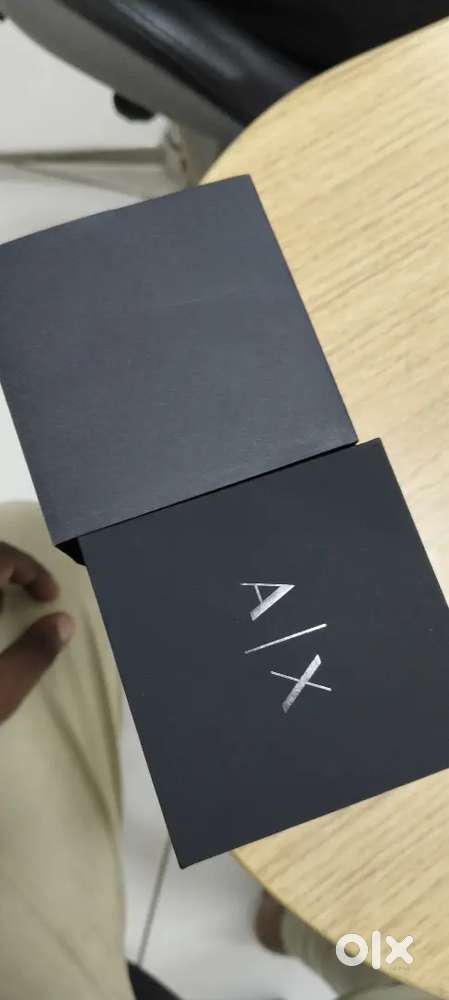 It's ARMANI EXCHANGE STAINLESS STEEL