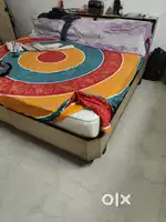 Double bed with two side cabinets