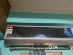 1.5 ton AC in good and working condition.