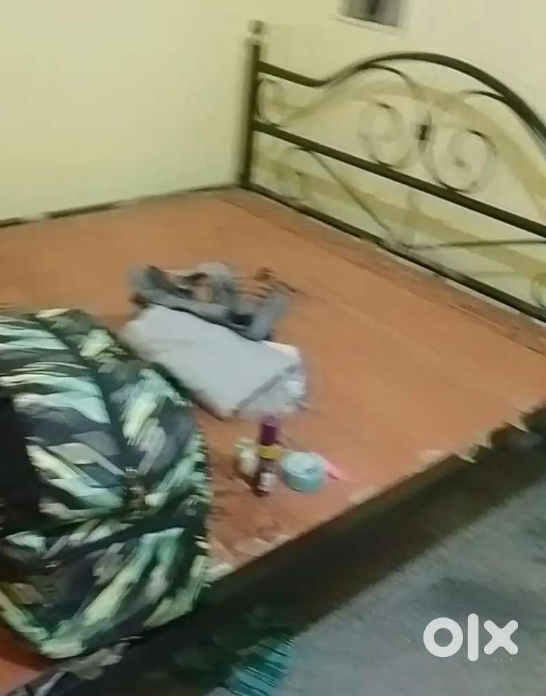 Double metal bed with plywood
