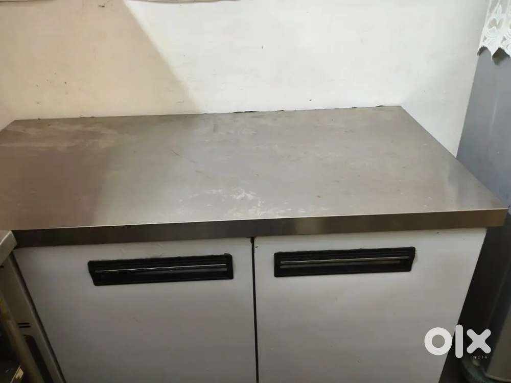 Cake counter and fridge