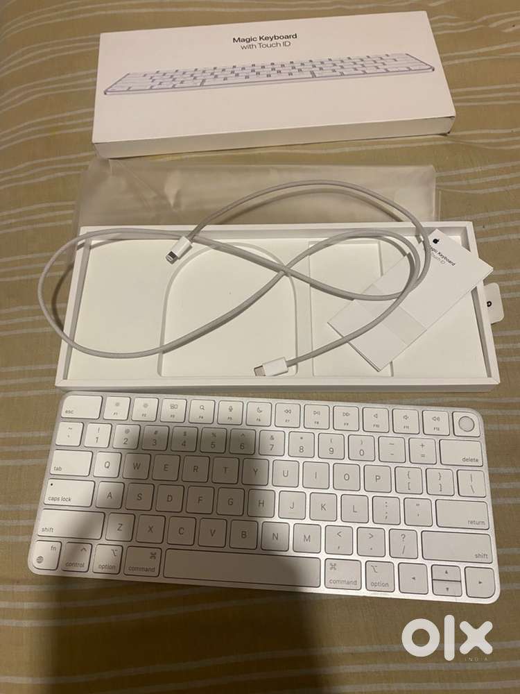Apple keyboard with touch id