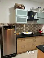 Microwave,fridge,washing machine,chimney,smart tv 32 inch and sofa
