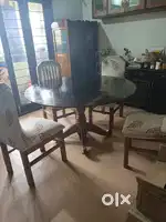 Glass top dining table