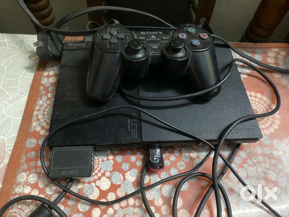 Ps2 with 4 games in pan drive