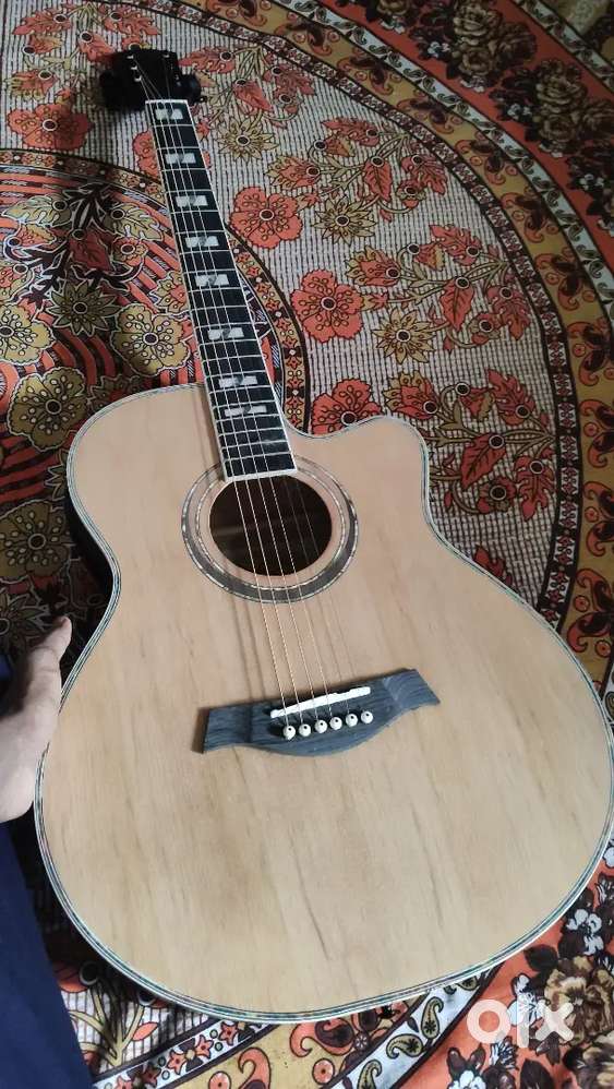 Semi acoustic guitar 5 months old