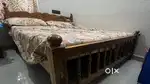 A queen size cot and bed for sale