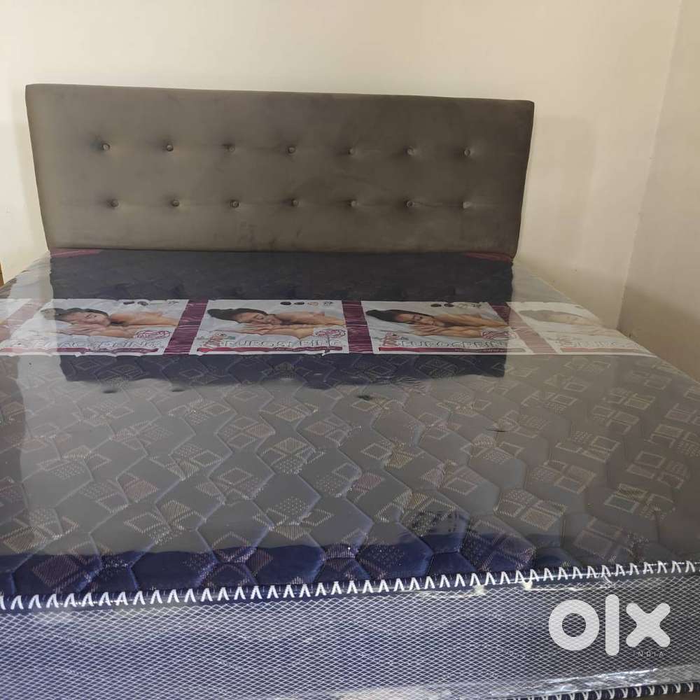 Unused 78x72 cot with Bonnell spring mattress for sale