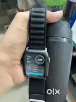Apple  watch series 4 cellular watch with 2 straps and charger
