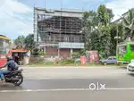 Commercial building 9000 sq feet 12.5 cent MC road side 4 crore
