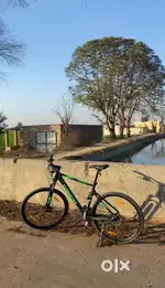 Black, 21 Speed Gear, Hybrid Cycle, Lockout Suspension, Disc Brake