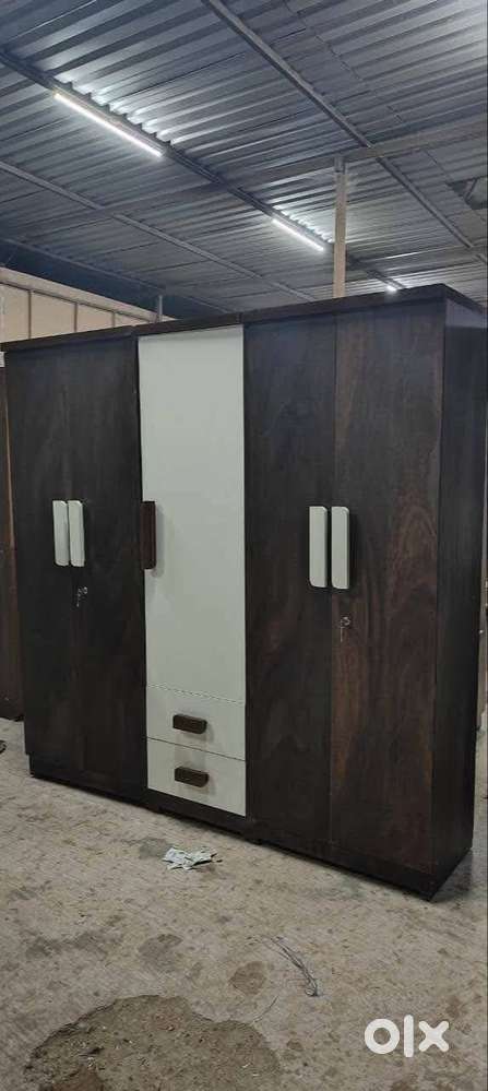 AMPLE STORAGE OF THIS 5 DOOR WARDROBE WITH WOODEN HANDLE FOR SELL