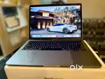 MacBook Pro i7 – 13” Display, 126 Cycle Count