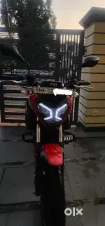 TVS raider 2024 top model super squad edition red