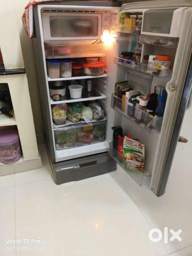 L.G 5 star old fridge grey colour working condition