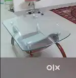 Glass top center table