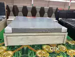 Box bed with attached side table