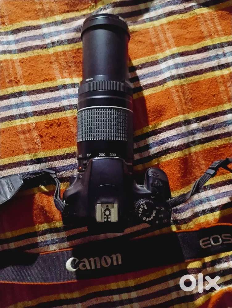 Canan 1000 D With  75 ,300 lence