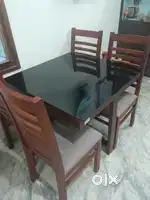 4 chair with glass top Dinining table