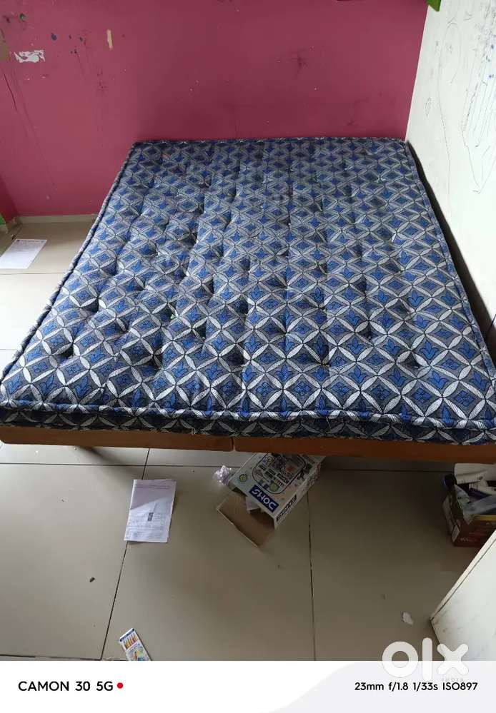 BED WITH HEAVY MATRESS AND CHAIRS WITH TABLE